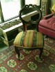 silla tapizada y tallada (alto 90cm, ancho 48cm, fondo 46cm) $45.000